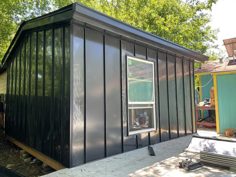 Black standing seam metal wall panels for Metal Roof Installation in Dulles Town Center