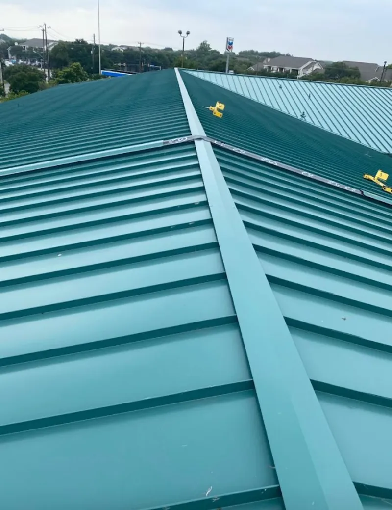 Green commercial metal roof ridge and valley for Metal Roof Repair in Dulles Town Center