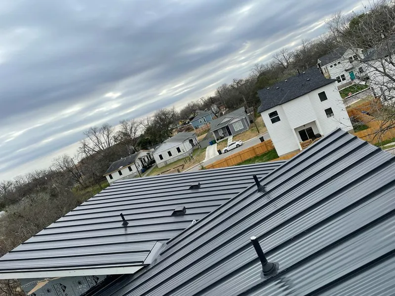 Standing seam metal roof panels with vents for Skylight Repair in Dulles Town Center